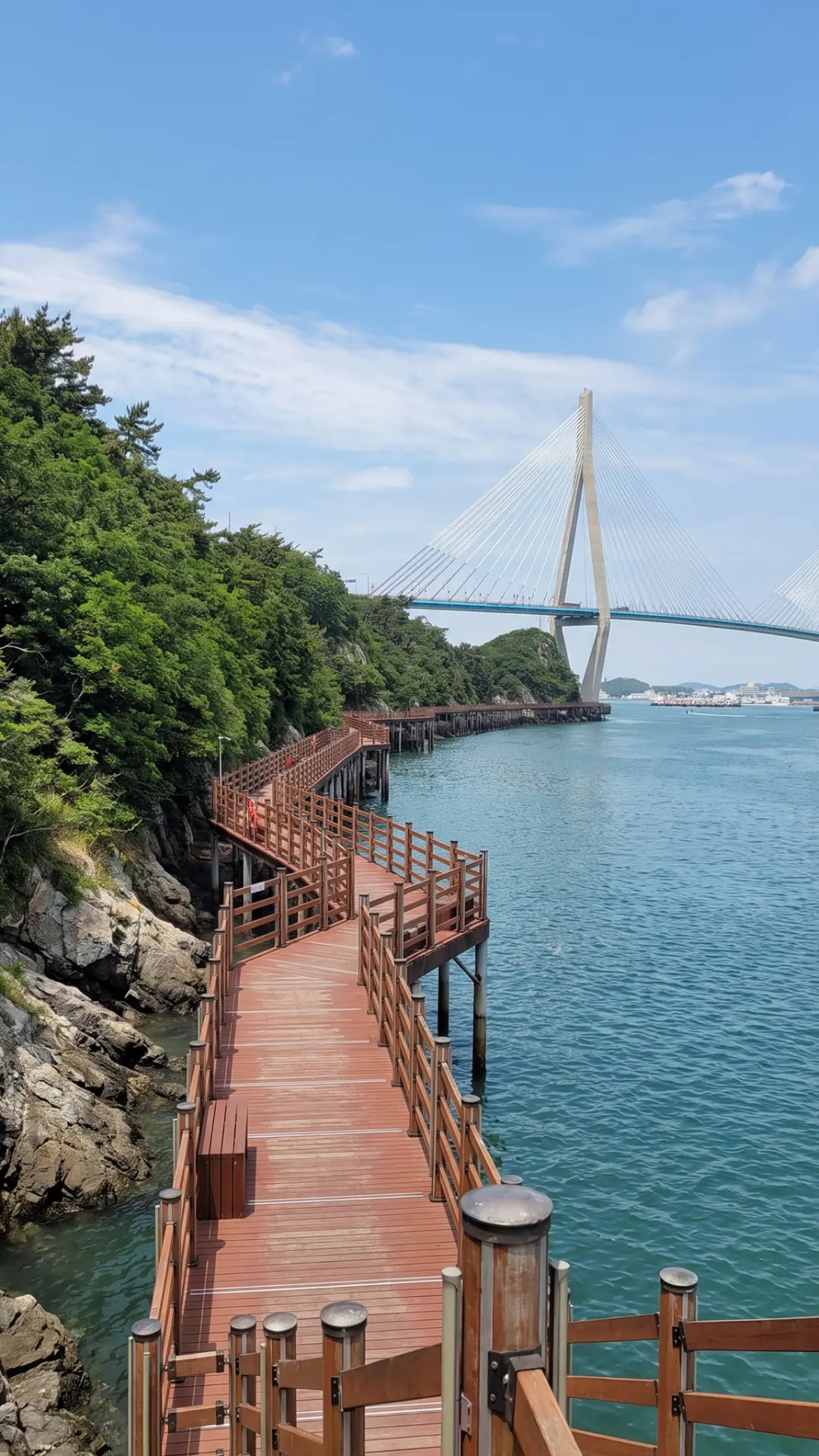 Wooden boardwalk of Gohado Sea Deck stretching over the water in Mokpo